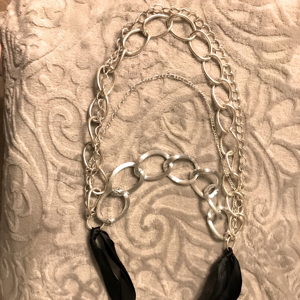 Silver multilayer necklace with black ribbon ties